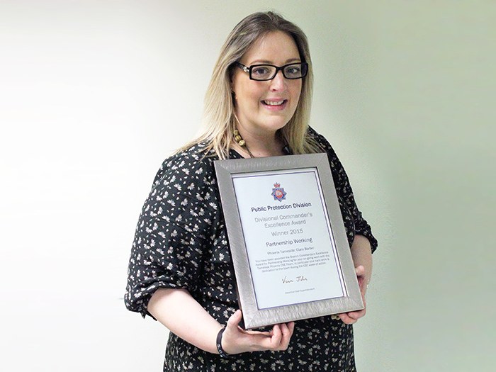 Clare Barber is delighted to receive her Branch Commanders Excellence Award 